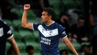 Nishan Vellupilay celebrates scoring for Melbourne Victory against Perth Glory